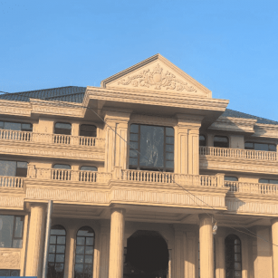 呼伦贝尔黄金麻别墅外墙干挂石材效果示例