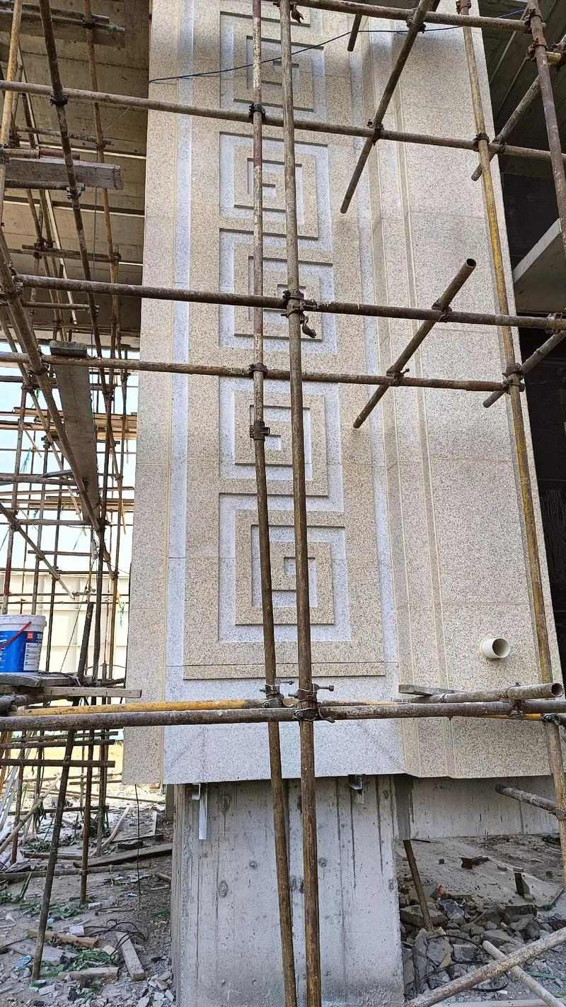 呼伦贝尔 黄金麻花岗岩别墅外墙干挂回纹造型效果