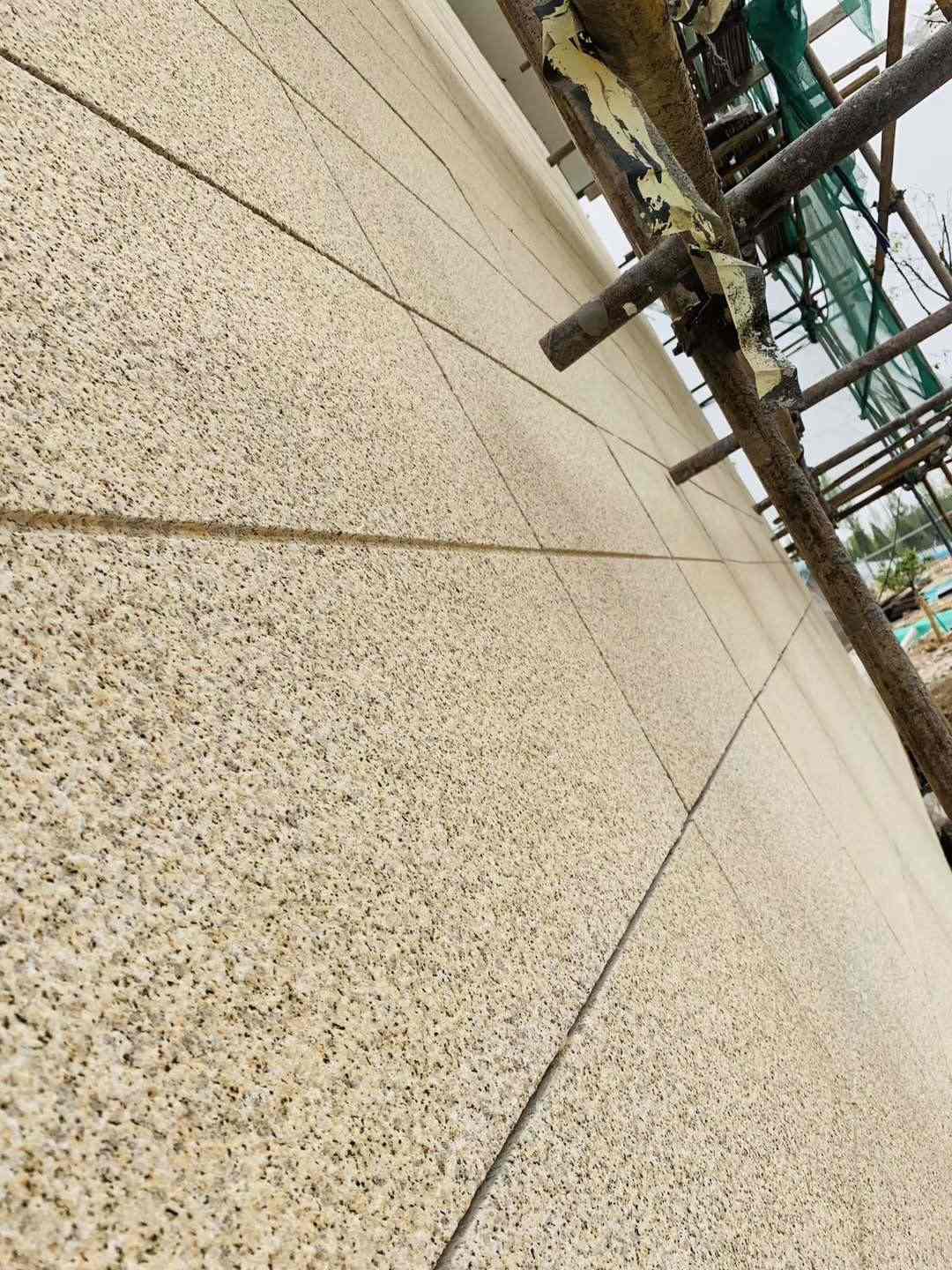 呼伦贝尔 黄金麻花岗岩荔枝面外墙干挂石材效果示例